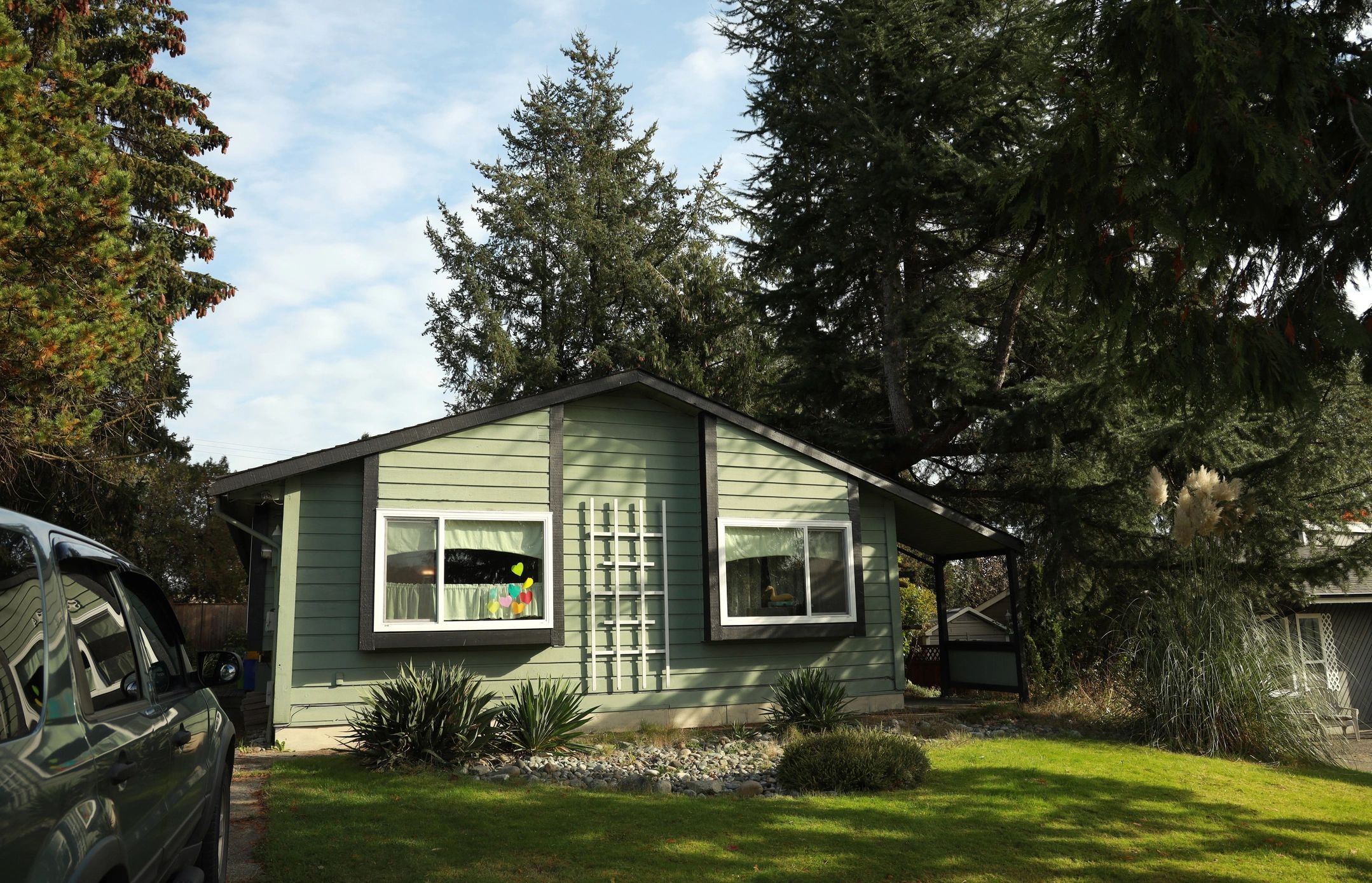 Welcoming single-story home with front lawn