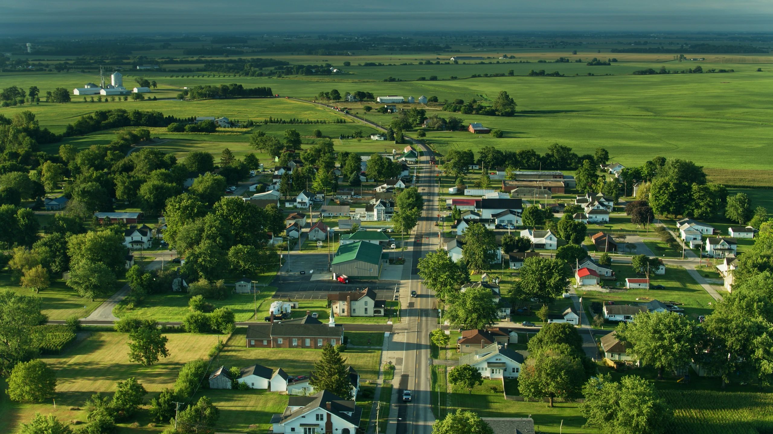 Aerial view of a small Midwest town and surrounding farmland