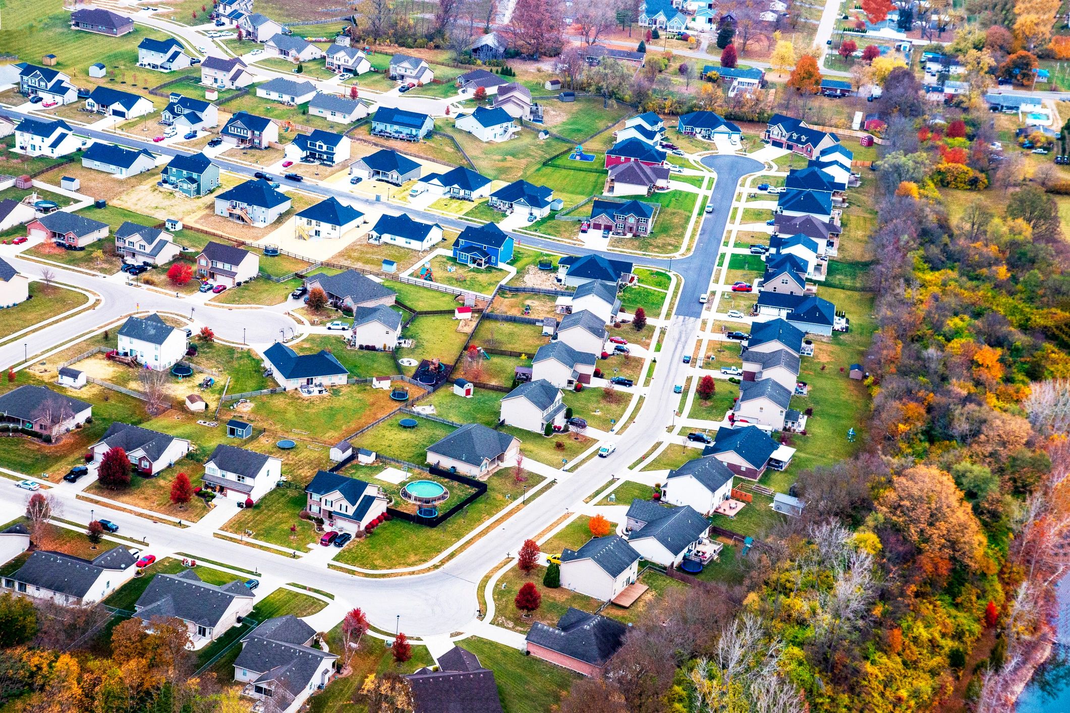 Aerial view of a Midwest neighborhood with homes and trees